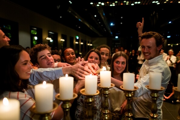 Candle lighting with friends at a Bar Mitzvah in Israel