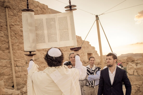 Bar Mitzvah in Israel holding a Torah