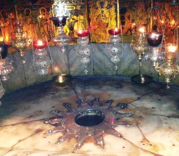 The inscribed star on the Altar in the Church of the Nativity at Manger Square, Bethlehem where Jesus was born.