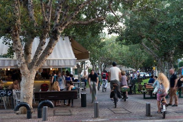 biking along rothschild boulevard in tel aviv biking along rothschild boulevard in tel aviv