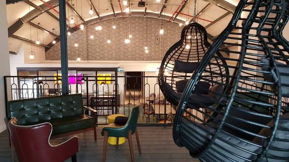 lounge at the Cinema Hostel in Jerusalem, a former cinema house