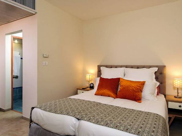 standard room at the Sephardic House Hotel in the Jewish Quarter of the Old City of Jerusalem standard room at the Sephardic House Hotel in the Jewish Quarter of the Old City of Jerusalem