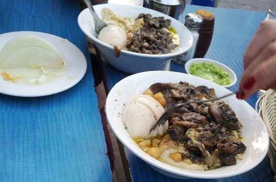 hummus with hot mushrooms on top hummus with hot mushrooms on top