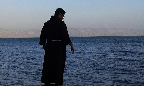 monk at Capernaum near the Sea of Galilee in Israel monk at Capernaum near the Sea of Galilee in Israel