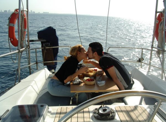 Enjoying a meal on a romantic boat hotel in Tel Aviv