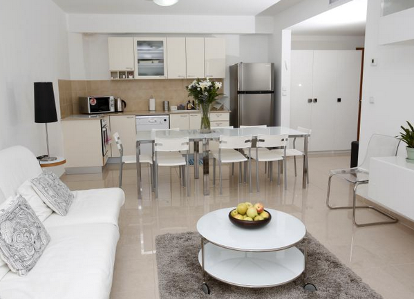 spacious living room, dining and kitchen at the Windows of Jerusalem apartment hotel spacious living room, dining and kitchen at the Windows of Jerusalem apartment hotel